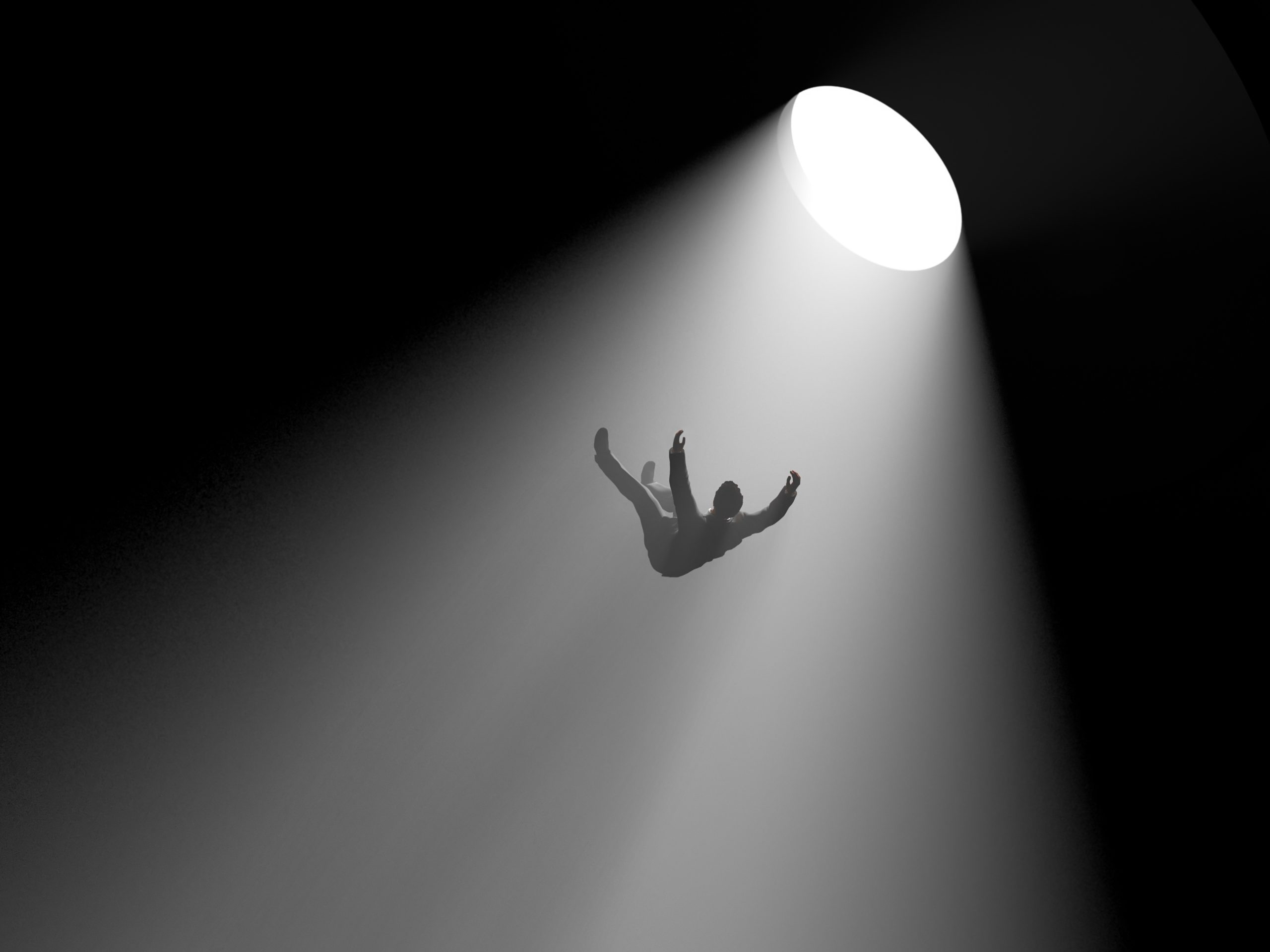 man falling into a hole